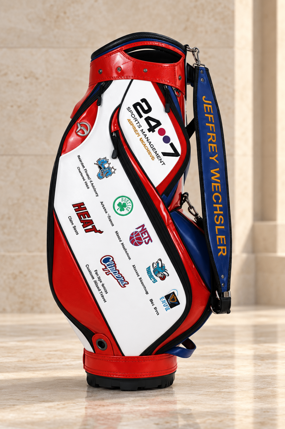 Professional sports agency tour staff bag with team crests on red, white and royal
